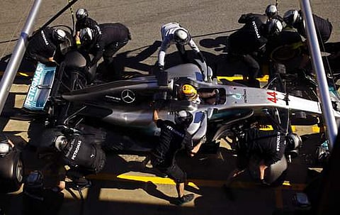 Mercedes driver Lewis Hamilton of Britain has his tyres changed during a Formula One pre-season testing session. (File photo | AP)