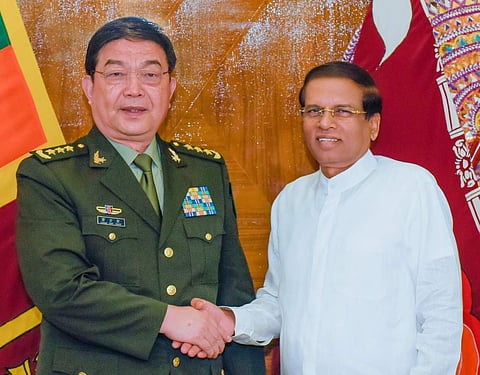 Chinese Defense Minister and State Councilor, Gen.Chang Wanquan with Sri Lankan president Sirisena. (EPS)