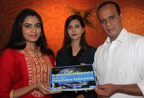 Actress Sangeetha Bhat releases Dr S K Jain’s ‘Kalachakra Ephemeris’ almanac in Bengaluru on Monday. Jain’s daughter Sandhya Jain looks on | S Manjunath