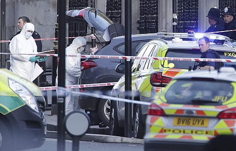 Police forensic officers at the scene close to the Houses of Parliament in London, Wednesday, March 22, 2017. A knife-wielding man went on a deadly rampage in the heart of Britain's seat of power Wednesday. | AP