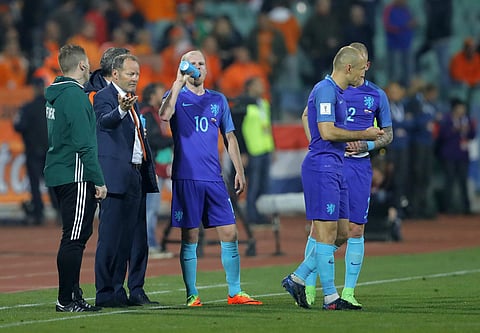 Netherlands' coach Danny Blind, second from left, gives directions to his players during their World Cup Group A qualifying soccer match against Bulgaria, at the Vassil Levski stadium in Sofia, Bulgaria, Saturday, March 25, 2017. | AP