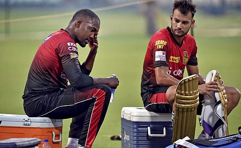 KKR cricketers Darren Bravo and Sheldon Jackson in a practic session for the upcoming IPL match at Eden Garden in Kolkata on Sunday. | PTI