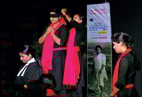 A scene from the street play ‘Mattuvin Chattangale’ at ‘Theruvarangu’, a street theatre festival organised in memory of actor P J Antony at Ernakulam Public Library on Thursday | K Shijith