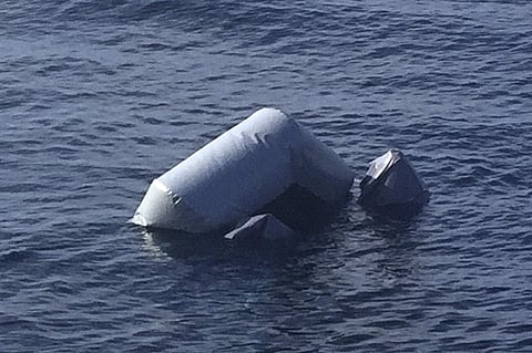 An upturned rubber boat floats in the Mediterranean Sea off the Libyan coast, during a search and rescue operation by Spanish NGO. (File Photo | AP)