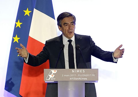 Conservative presidential candidate Francois Fillon delivers his speech in Nimes, Thursday, March 2, 2017. | AP