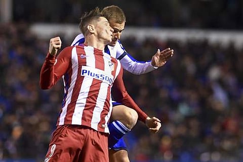 Atletico's Torres discharged from hospital after head injury. | AP