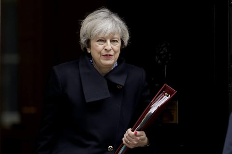 British Prime Minister, Theresa May, leaves 10 Downing Street in London, to attend Prime Minister's Questions at the Houses of Parliament (File Photo | AP)