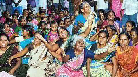Women breaking into an Oppari (song of lament) during a mock funeral for the hydrocarbon project at Neduvasal | Express