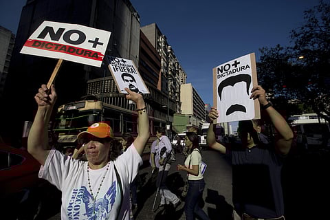 Opposition members take part in a protest against Venezuela's President Nicolas Maduro, in Caracas, Venezuela, Friday, March 31, 2017. (File | AP)