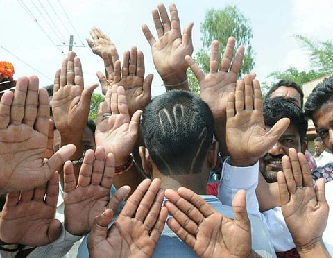 Congress supporters celebrate party's victory in Nanjangud and Gundlupet bypolls. (Udayashankar S | EPS)