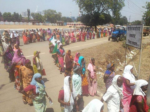 Tribal persons, farmers, women took out a protest rally against holding of “Gram Sabha” seeking “consent” for diverting their land for coal mine activities in Raigarh district of Chhattisgarh. | Express photos