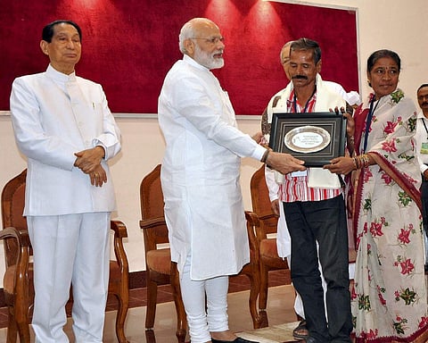 Bhubaneswar Prime minister Narendra Modi felicitates family members of martyrs at Raj Bhavan in presence of Governor S C. Jamir in Bhubaneswar on Sunday. (PTI)