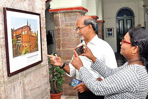 Visitors going round the heritage photo exhibition being organised at Hawa Mahal in Visakhapatnam on Monday | Express