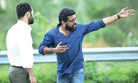 IS slogans and Saddam’s poster