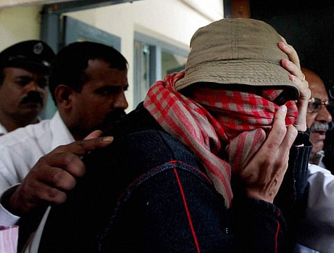 French Consulate employee Pascal Mazurier being taken to a hospital for a medical test for his alleged involvement in a sexual abuse case with his daughter in Bangalore IN 2012 (File | PTI)