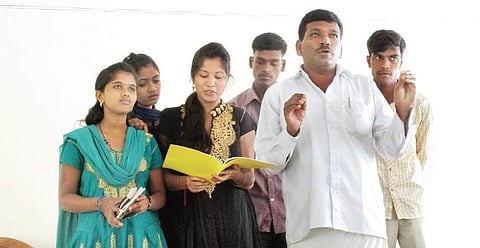 A self-taught A M Shivaswamy with the team