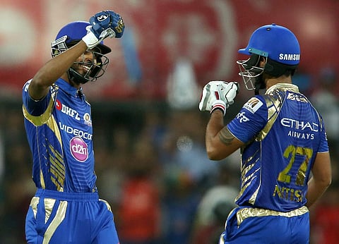 Hardik Pandya of the Mumbai Indians with team mate Nitish Rana celebrate as Mumbai Indians beat Kings XI Punjab by 8 wickets in Indore | PTI