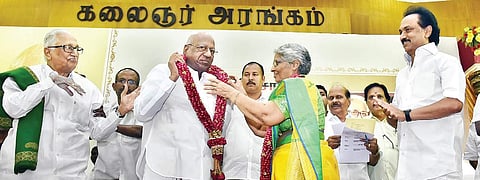 Arcot N Veerasamy and his wife exchange garlands on his 80th birth anniversary. M K Stalin and K Anbazhagan are also seen | P Jawahar