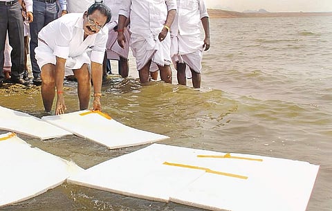 Sellur K Raju with the thermocol sheets to prevent evaporation from Vaigai Dam | kk sundar