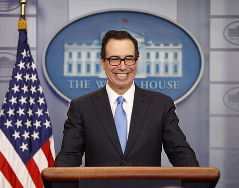 Treasury Secretary Steve Mnuchin smiles while speaking to the media during the daily briefing in the Brady Press Briefing Room of the White House in Washington, Monday, April 24, 2017. | AP