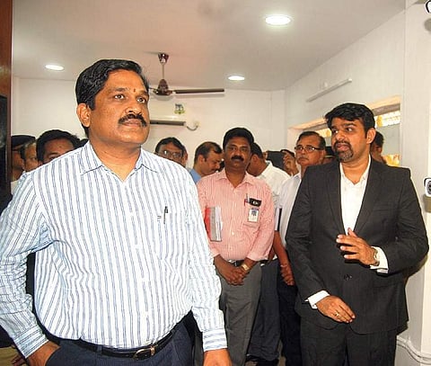 VPT chairman MT Krishna Babu visits an RFID pass issue counter, in Visakhapatnam on Monday | Express