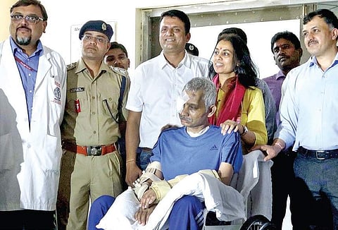 Chetan Cheetah being discharged from AIIMS, where he was admitted after he was shot at nine times during a fight in Srinagar, in New Delhi on Wednesday | Express