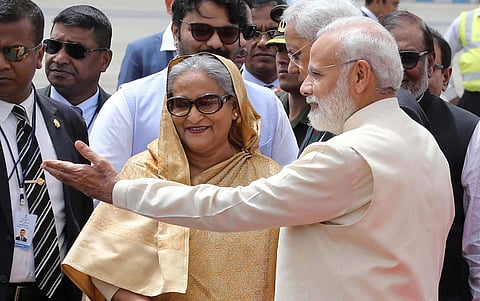 Prime Minister Narendra Modi receives his Bangladeshi counterpart Sheikh Hasina on her arrival at IGI Airport in New Delhi (Shekhar Yadav | EPS)