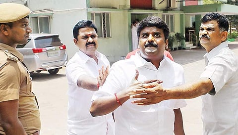 Health Minister Dr C Vijaya Basker reacts as IT officials raid his premises on Friday. | Express