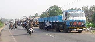 Vehicles stranded on a highway during the bandh in Baripada on Thursday I EXPRESS