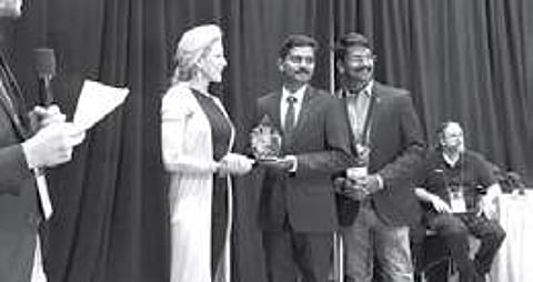 Aronin P, CEO of Sastra Robotics India, receiving TiE50 Award at Silicon Valley