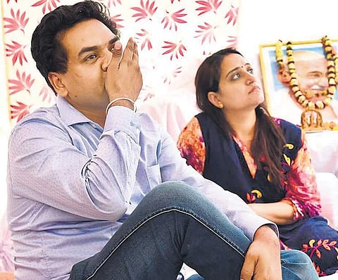 Kapil Mishra with his wife