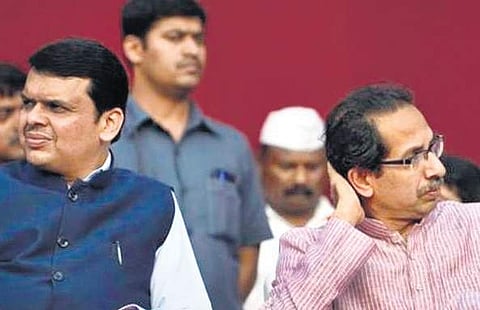 Devendra Fadnavis (left) with Uddhav Thackeray