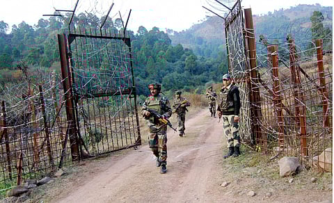 Soldiers take position near the Line of Control LoC in Poonch after cross-border shelling from Pakistan left two civilians dead and three injured in Nowshera sector in Rajouri district on Saturday. | PTI