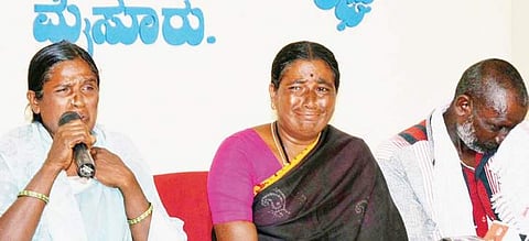The dalit family which is facing social boycott cries before the media at Hommaragalli in HD Kote taluk of Mysuru district on Saturday | Express
