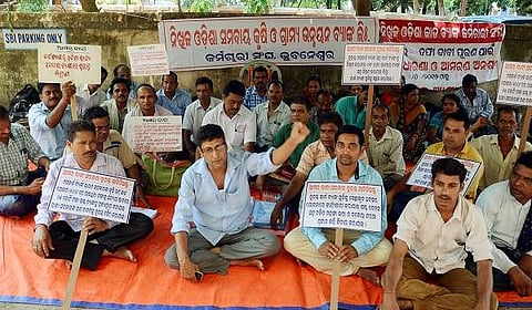 Members of All Odisha Card Bank Employees Union staging a protest in front of OSCARD office in Bhubaneswar on May 15 | Biswanath Swain