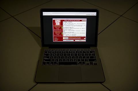 A screenshot of the warning screen from a purported ransomware attack, as captured by a computer user. (AP)