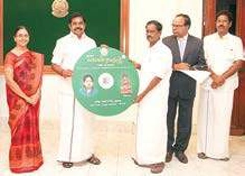 HR&CE Minister Sevvoor S Ramachandran receiving the first copy of Amma MennTamizh software from CM Edappadi K Palaniswami.