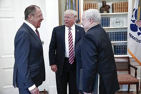 US President Donald Trump meets with Russian Foreign Minister Sergey Lavrov, left, next to Russian Ambassador to the U.S. Sergei Kislyak at the White House in Washington on May 10. (File Photo | AP)