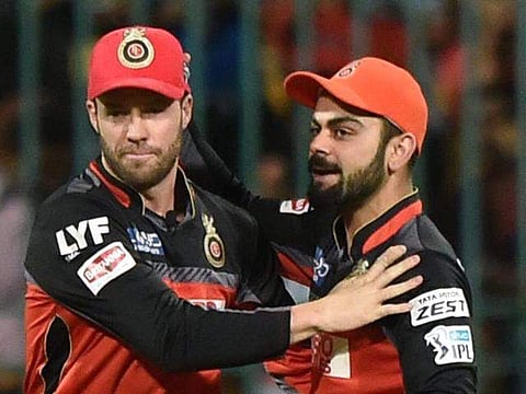 A B de Villiers with RCB captain Virat Kohli. (File | PTI)