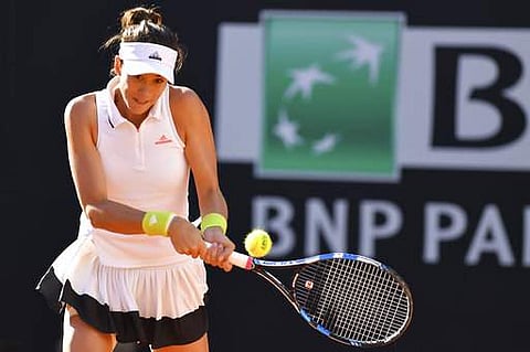 Spain's Garbine Muguruza returns the ball during her semi final match against Ukraine's Elina Svitolina at the Italian Open tennis tournament. | AP