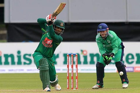 Bangladesh's Soumya Sarkar bats as Ireland's wicket-keeper Niall John O'Brien looks onduring the fourth ODI match of the Ireland Tri-Nation Series. | AP