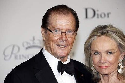 British actor Roger Moore and Cristina Tholstrup, his wife. (File Photo | AFP)
