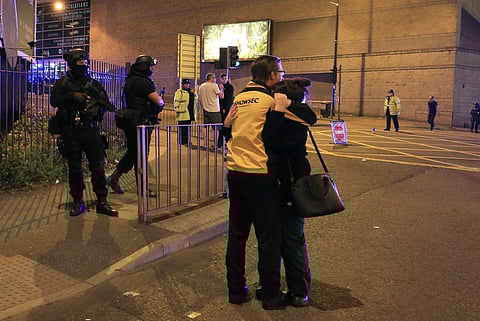 Armed police stand guard at Manchester Arena. (File photo | AP)