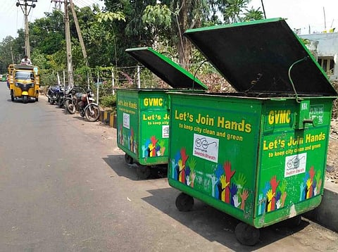 As the GVMC all set to introduce the segregation of waste at source, the civic authorities have set up separate dustbins for dry and wet garbage, in Visakhapatnam on Tuesday | Express