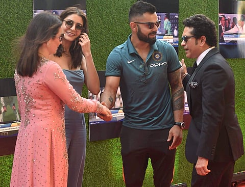 Master blaster Sachin Tendulkar and his wife Anjali Tendulkar with cricketer Virat Kohli and actress Anushka Sharma at the screening of the biopic 'Sachin A Billion Dreams' in Mumbai on Wednesday. | PTI