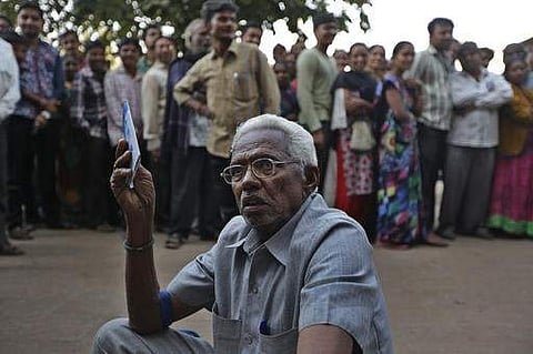 People standing in queue. (File Photo | AP)
