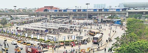 Various modes of transport operating at Koyambedu in the city, where the swanky new Metro Rail runs above the sprawling Chennai Mofussil Bus Terminus on Wednesday | P JAWAHAR