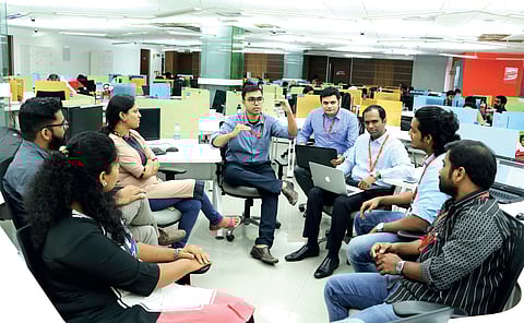 Deepu Prakash and Dileep along with the team members of Fingent Sarath P