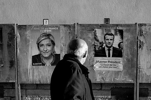 French presidential candidates Emmanuel Macron and Marine Le Pen. | AFP