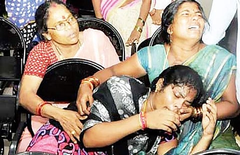Family members of victims who suffered burns at the blast in AZICO Pharma at Parawada in Visakhapatnam on Tuesday | Express photo